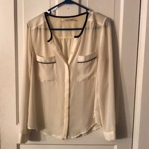 Sheer blouse with black detail